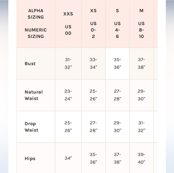 Free People Lotta Love Romper In A Washed Pink Color with Pockets - Picture 9 of 9